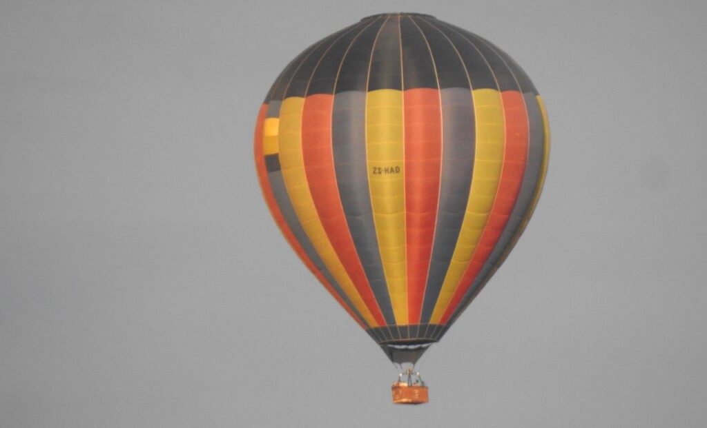 Vibrant hot air balloon floating in the sky, detailed close-up view